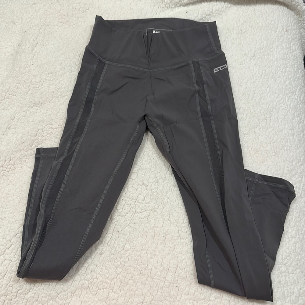 Workout leggings with mesh strip down the sides